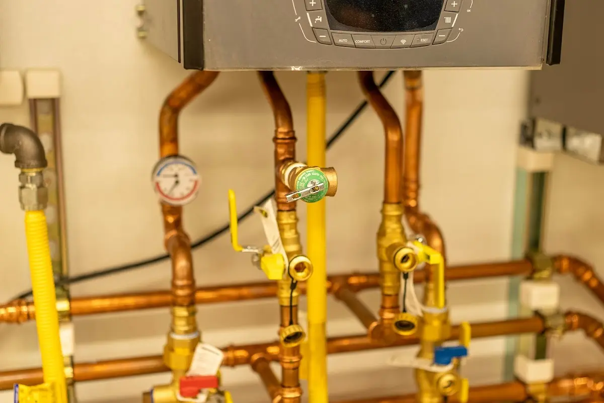 Licensed technician providing Backflow Prevention for a homeowner in Evansdale